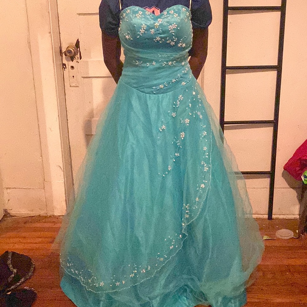 This is an extra small coronation dress, it has only been worn once .